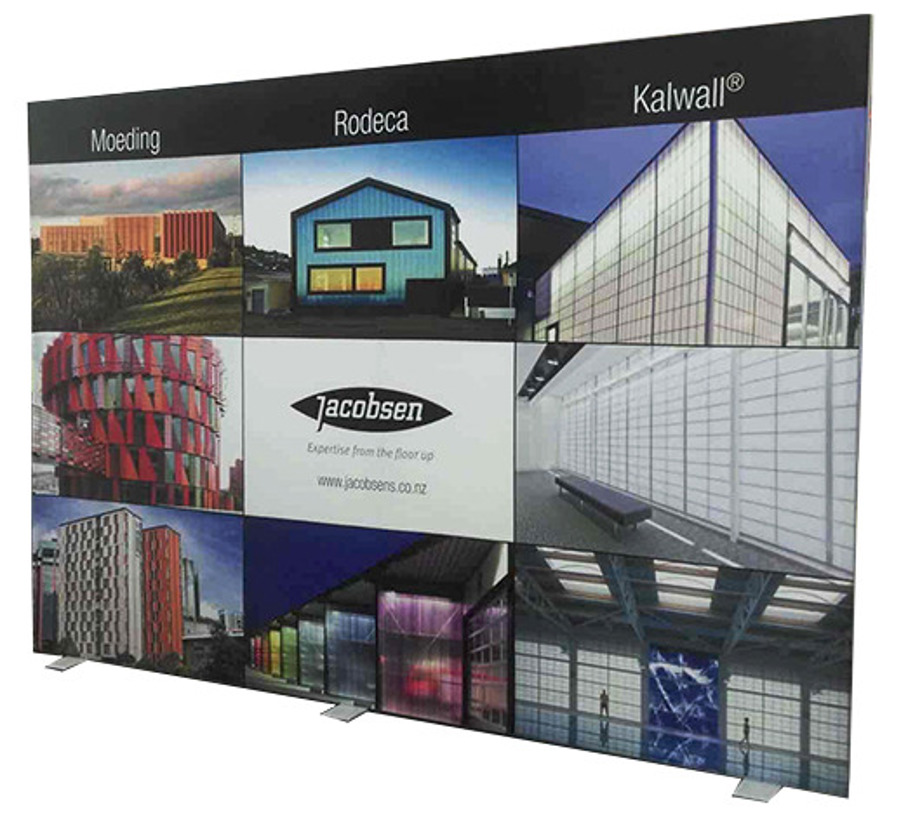 Freestanding tension fabric display wall printed with a grid of architectural photographs for a building products supplier