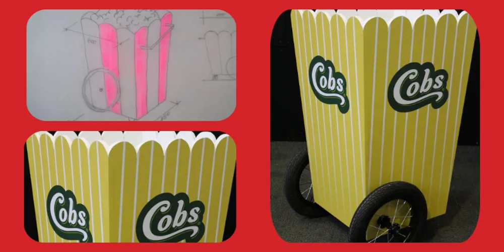 COBS popcorn sampling trolley shaped like a popcorn tub, with the original concept sketch